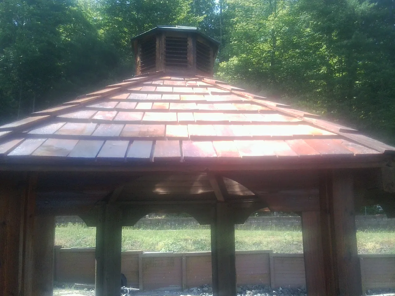 New cedar shake roof and cupola on a lakeside gazebo in Big Stone Gap